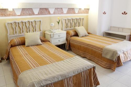 Posteľ alebo postele v izbe v ubytovaní 4Dreams Hotel Chimisay