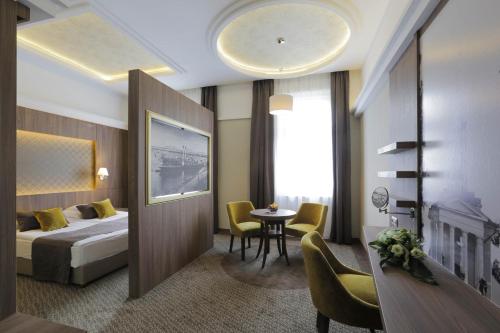Postelja oz. postelje v sobi nastanitve Duna Wellness Hotel