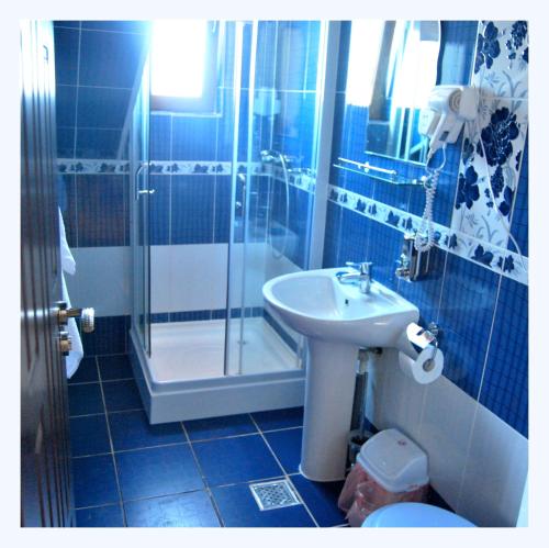 Ванная комната в Pensiunea Pluto Sulina