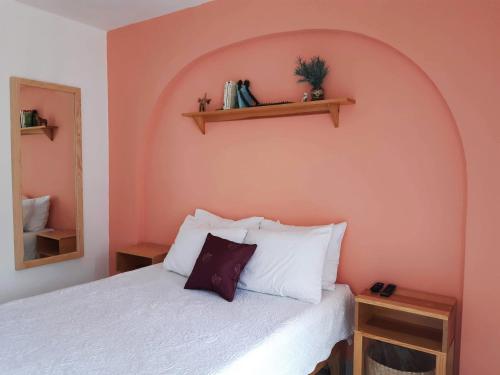 En eller flere senger på et rom på Casa Matia