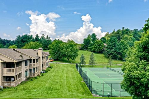 an aerial view of a tennis court at a resort at Chetola Cardinal 201 in Blowing Rock