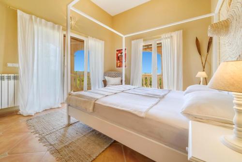 Säng eller sängar i ett rum på Villa Turo del Sol