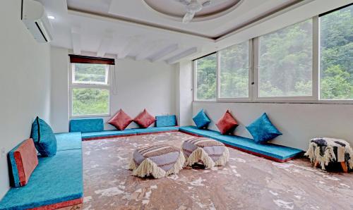 Area soggiorno di Hotel Hidden Delight Rishikesh