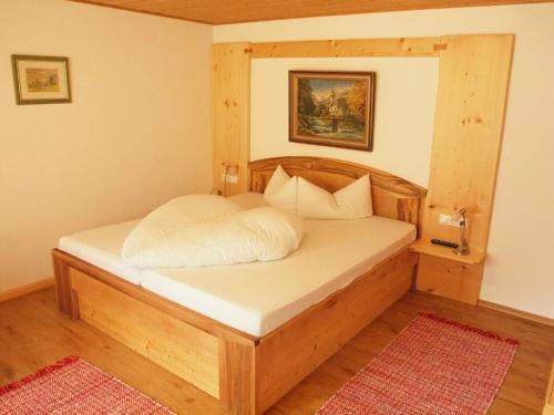 Ένα ή περισσότερα κρεβάτια σε δωμάτιο στο Gästehaus Watzmannblick