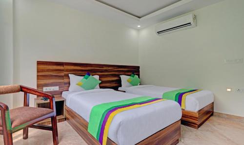 Letto o letti in una camera di Hotel Hidden Delight Rishikesh