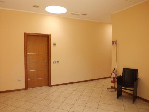 A television and/or entertainment centre at Al Flor