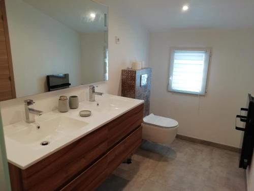 Koupelna v ubytování Appartement au dessus de la maison du Saunier