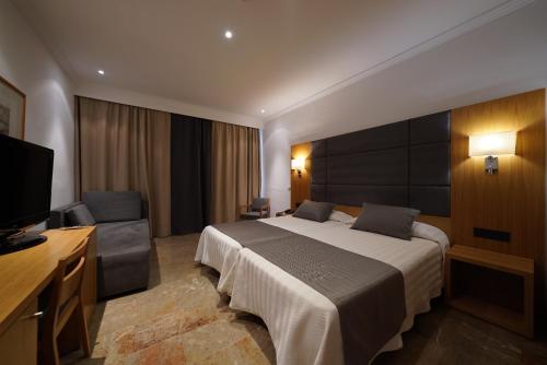 TV a/nebo společenská místnost v ubytování Hotel Artmadams