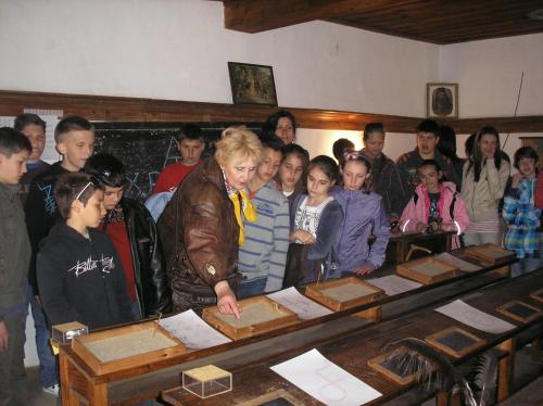 a group of people standing around a table at Family Hotel Flora in Zlatograd