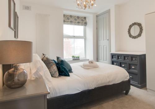 Postel nebo postele na pokoji v ubytování Elenydd Apartment