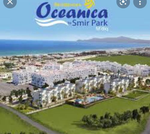 an aerial view of an apartment complex at the beach at Oceanica by Smir Park luxury apartment Marina Smir in M'diq