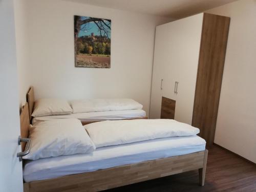 Ένα ή περισσότερα κρεβάτια σε δωμάτιο στο Ferienbungalows Vital