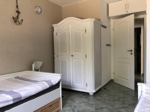 Postel nebo postele na pokoji v ubytování Oland Whg 1 Wattläufer