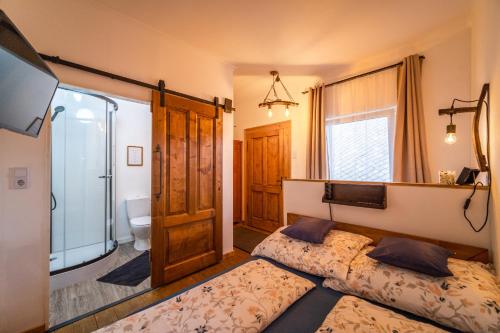 Posteľ alebo postele v izbe v ubytovaní Villa Theresienhof