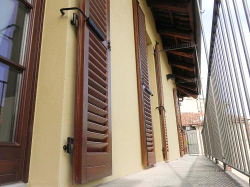 an open door on the side of a building at La Casa di Milly in Alba