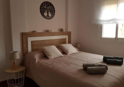 Postel nebo postele na pokoji v ubytování Vera Playa Naturista PLENO SOL