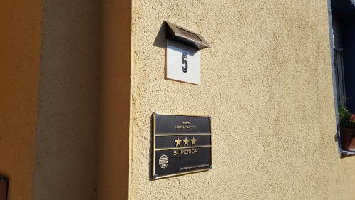 a sign on the side of a building at Landhaus Effeld in Wassenberg