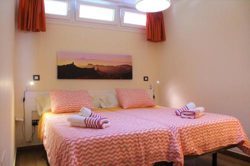 En eller flere senge i et værelse på Sea View San Agustin by Privilege Bay