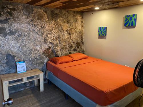 Krevet ili kreveti u jedinici u objektu Captain Morgan Hostel Lake Coatepeque