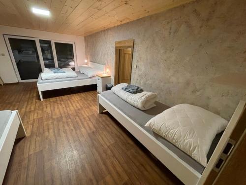 Postel nebo postele na pokoji v ubytování Chata Sedloňov