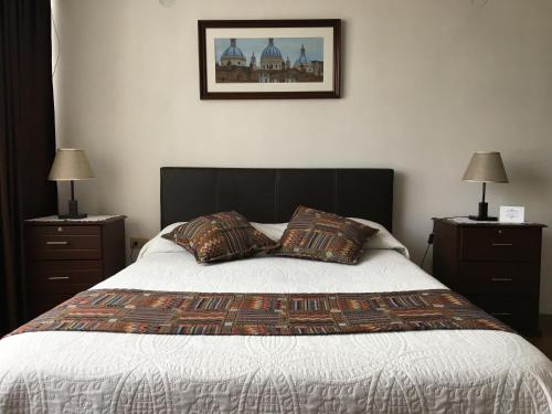 Postel nebo postele na pokoji v ubytování La Casa De La Nonna