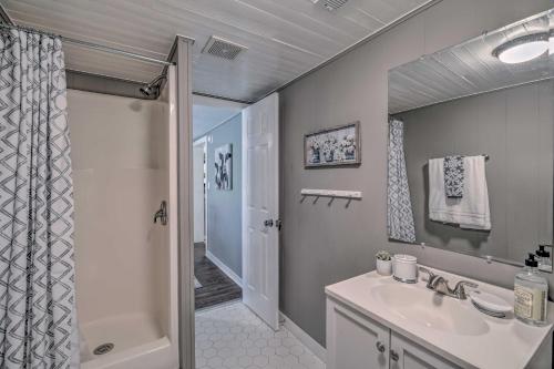 a bathroom with a sink and a shower at Damascus Cottage with Fire Pit - 1 Mi to Trails in Damascus