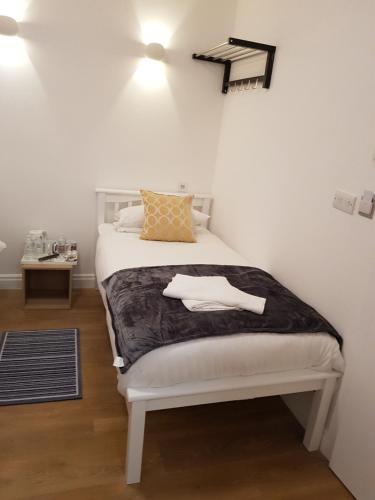 Postel nebo postele na pokoji v ubytování City London Hotel