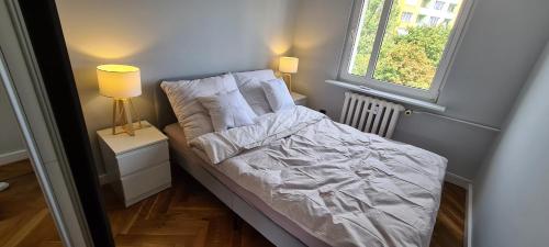 Posteľ alebo postele v izbe v ubytovaní Apartament Holiday Gdynia