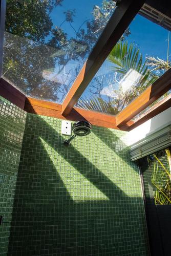 a view from the floor of a room with a window at Morada Prainha in Garopaba