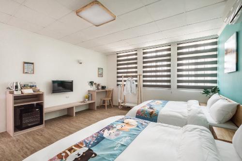 Voodi või voodid majutusasutuse Hibnb Guesthouse toas