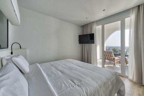 Postel nebo postele na pokoji v ubytování Bitzaro Boutique Hotel