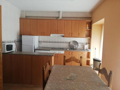 Kuchyň nebo kuchyňský kout v ubytování Casa Rural el Picozo