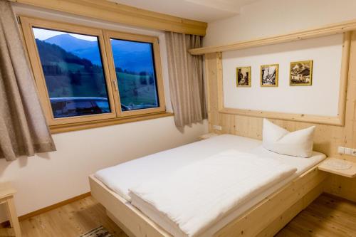 Säng eller sängar i ett rum på Buachbinder Hof