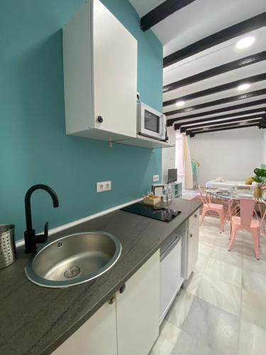 Kuchyň nebo kuchyňský kout v ubytování Apartamentos - Alameda