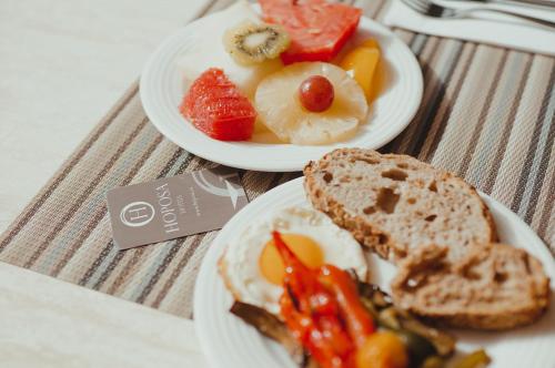 two plates of breakfast food on a table at Hoposa Bahia in Port de Pollensa