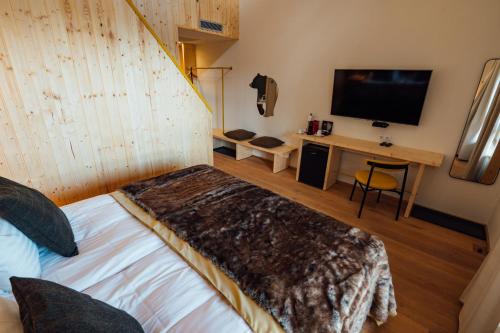 Letto o letti in una camera di Balvanyos Resort - Peakture Hotel & Grand Hotel Balvanyos