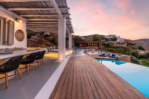 an image of a villa with a swimming pool at Villa Artisti Mykonos in Agrari