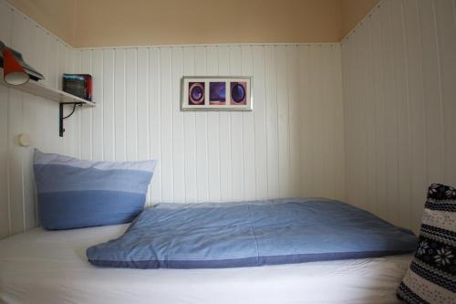 Postel nebo postele na pokoji v ubytování Oland Whg11 Sünnenkieker