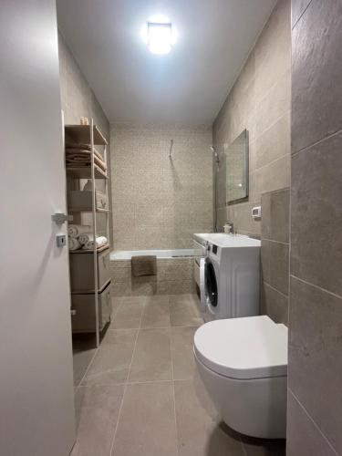 Vonios kambarys apgyvendinimo įstaigoje Rekord Park Apartments