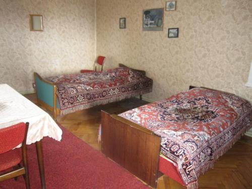 Postel nebo postele na pokoji v ubytování TLT Guest House