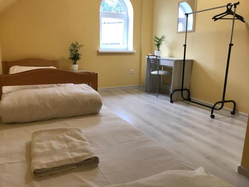 Pelican Guest House & Hostelにあるベッド