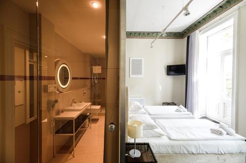 Kúpeľňa v ubytovaní Home Aparthotel