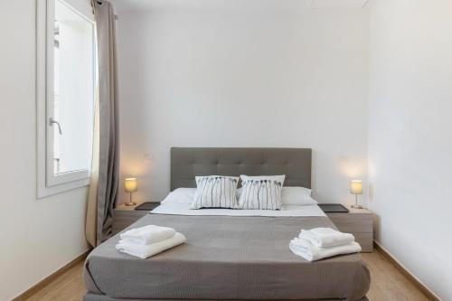 Ένα ή περισσότερα κρεβάτια σε δωμάτιο στο San Vincenzo Rooms Vigonza