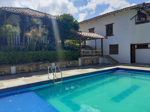 Bazén v ubytování Finca Hotel El Paraíso nebo v jeho okolí