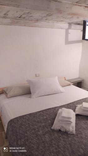 Postel nebo postele na pokoji v ubytování Il Rifugio Luxury House & Spa