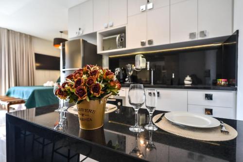 Kuchyň nebo kuchyňský kout v ubytování Rosemari's Apartments RP Deluxe Living