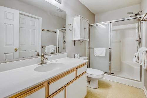 a bathroom with a sink and a toilet and a shower at River Oaks Retreat in Myrtle Beach