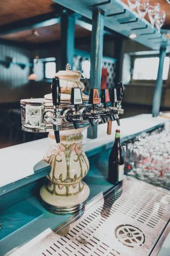 a bottle of wine sitting on top of a bar at Landgasthof Zum Hammerschmied in Ranten