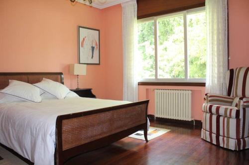 Un pat sau paturi într-o cameră la Casa Amalia - En el corazón verde de Cantabria!!