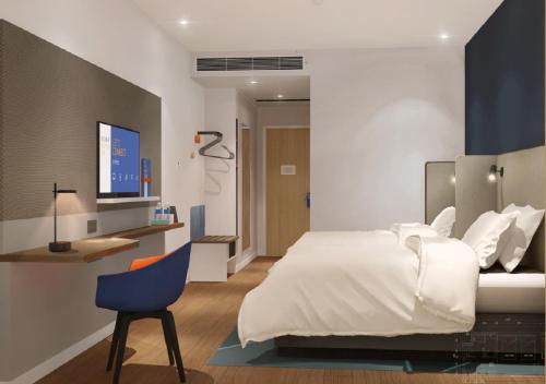 Postel nebo postele na pokoji v ubytování Holiday Inn Express Xi'an High Tech South by IHG